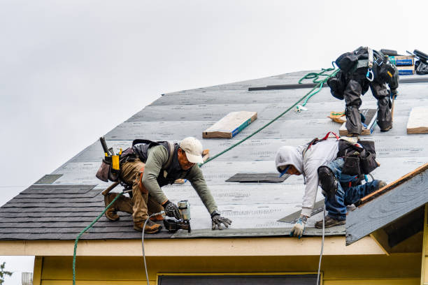 Professional Gutter Installation technician working in Woodcliff Lake, NJ